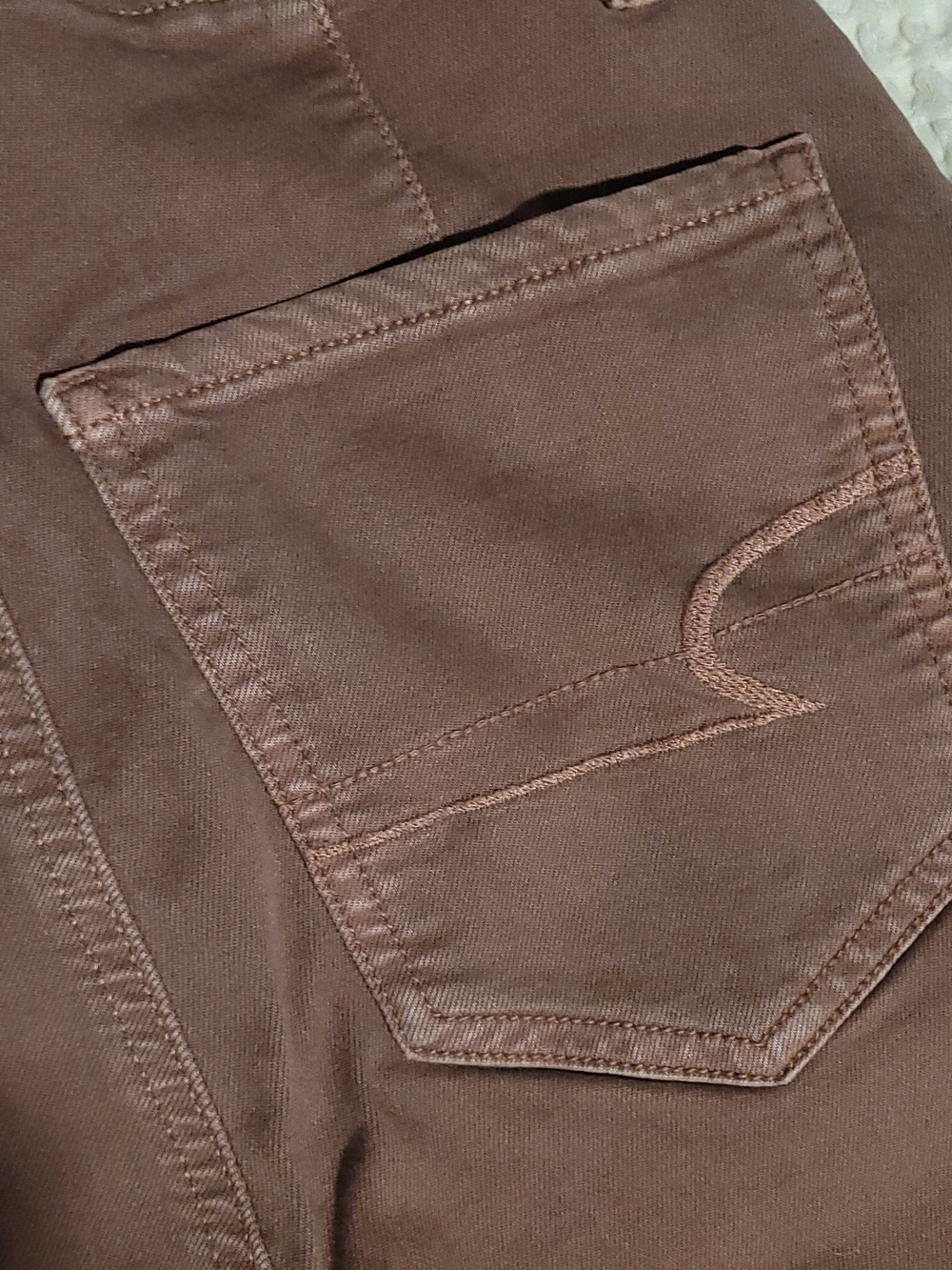 American Eagle Women's Suoer High Rise Flare Jeans in Mauve / Pink